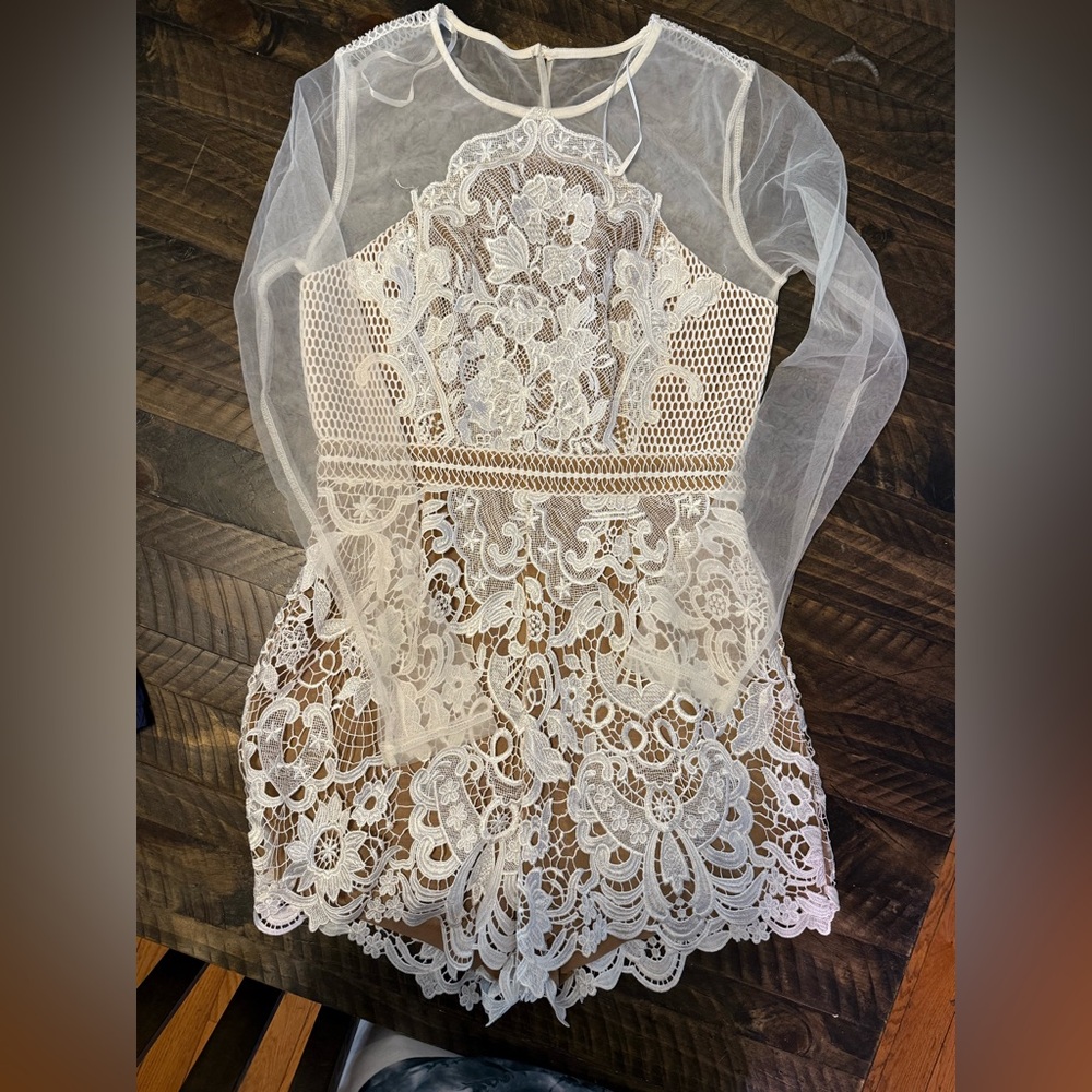 Blithela Lace Romper . Brand new